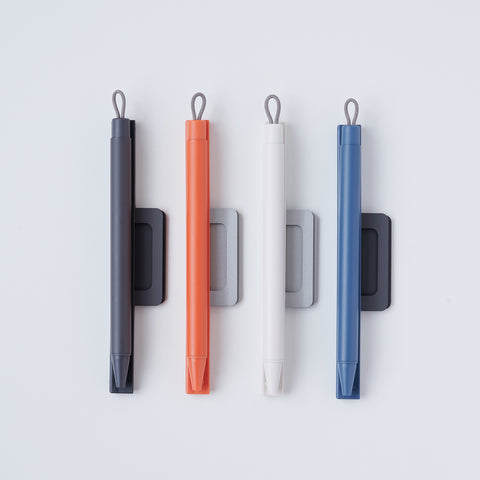 Magnet holder ballpoint pen set in white, black, orange, and blue-grey, by ZEBRA Japan.