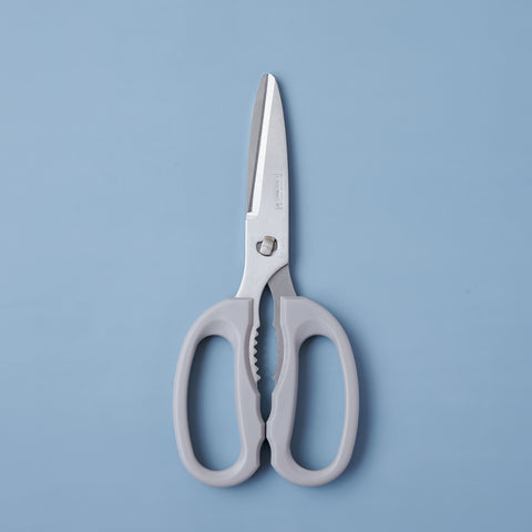 Left-handed kitchen shears with serrated stainless steel blades and soft resin handles, disassemblable for easy cleaning.
