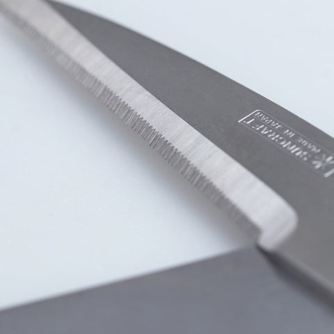 Left-handed kitchen shears with serrated stainless steel blades and soft resin handles, disassemblable for easy cleaning.