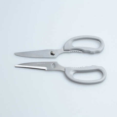 Left-handed kitchen shears with serrated stainless steel blades and soft resin handles, disassemblable for easy cleaning.