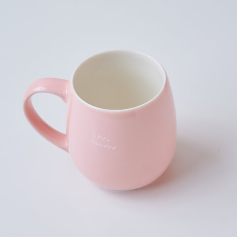 The design is visible when held in the left hand.