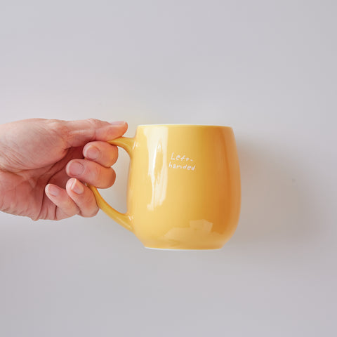 The design is visible when held in the left hand.