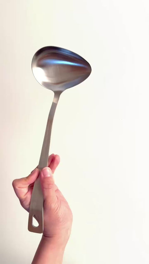 Left-handed side-pour soup ladle made of 18-8 stainless steel, 75ml capacity, crafted in Japan.