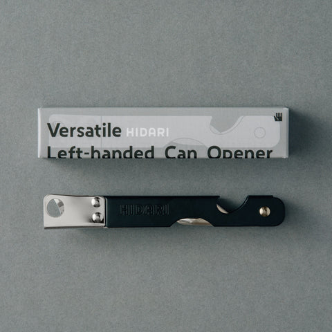 Versatile left-handed can opener with matte black finish, 3-in-1 functionality for cans, bottles, and hole punching, ergonomic design for left-handed users, made in Japan by HIDARI.