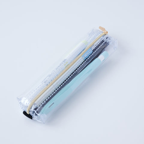 Book strap pencil case with adjustable band, clear PVC, holds 3–4 pens, Japan-made notebook accessory.