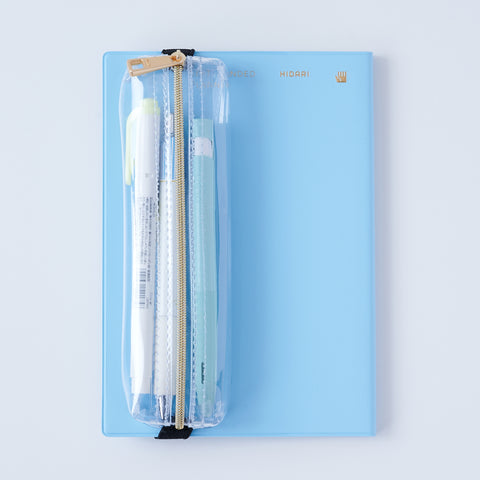 Book strap pencil case with adjustable band, clear PVC, holds 3–4 pens, Japan-made notebook accessory.