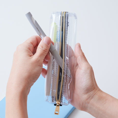 Book strap pencil case with adjustable band, clear PVC, holds 3–4 pens, Japan-made notebook accessory.