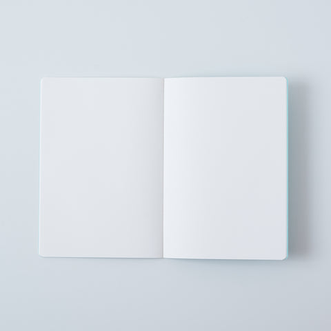 Set of 3 unlined HIDARI notebooks in assorted cover colors, designed for left-handed planners.