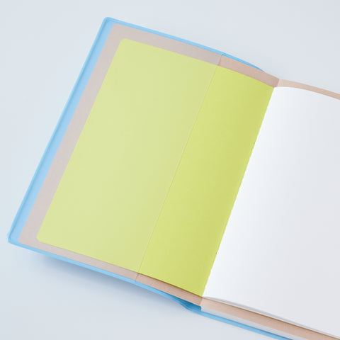 Set of 3 unlined HIDARI notebooks in assorted cover colors, designed for left-handed planners.