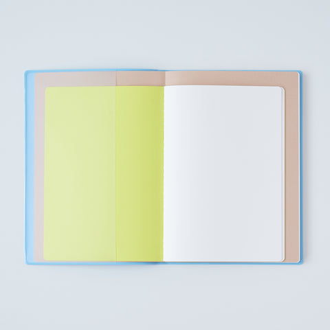 Set of 3 unlined HIDARI notebooks in assorted cover colors, designed for left-handed planners.