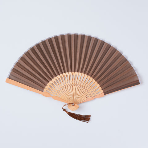 Left-handed folding fan with silk fabric and light brown bamboo ribs, includes cloth case and wooden gift box.