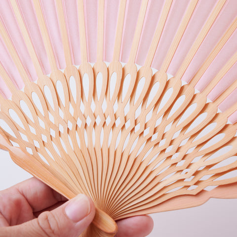 Left-handed folding fan with silk fabric and light brown bamboo ribs, includes cloth case and wooden gift box.