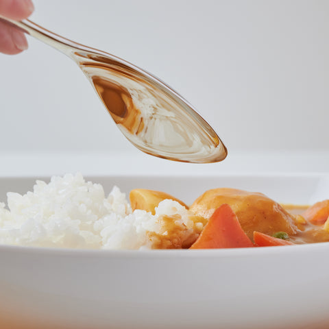 Left-handed stainless steel spoon designed for curry and rice, polished finish.