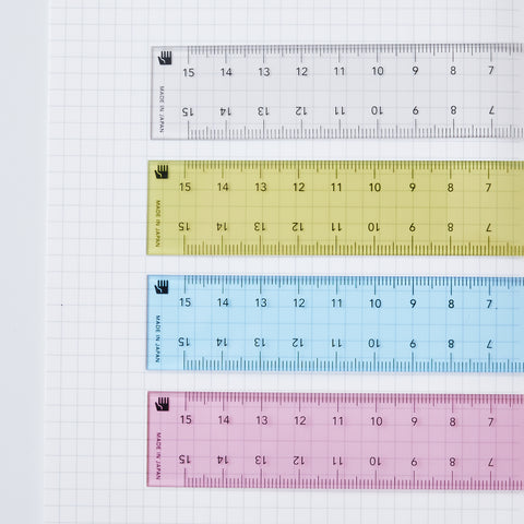 15cm double-sided ruler by HIDARI, designed for left- and right-handed users. Features edge-start scales and eco-friendly recycled PET.