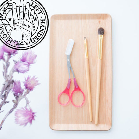 Eyebrow scissors for left-handed users