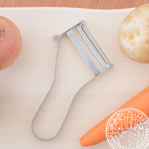 Left-handed vegetable peeler, ultra-sharp 440A stainless blade, ergonomic design, Japanese quality.