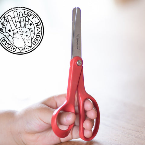 FISKARS kids scissors for left-handed users. Red handles, rounded tips, ergonomic grip, Finnish quality.