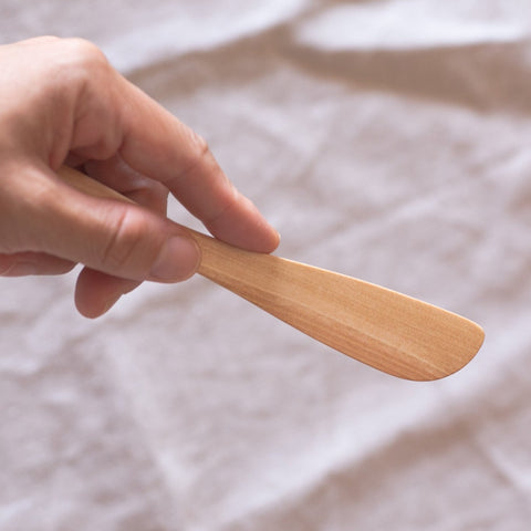 Betula schmidtii wood butter knife, left-handed