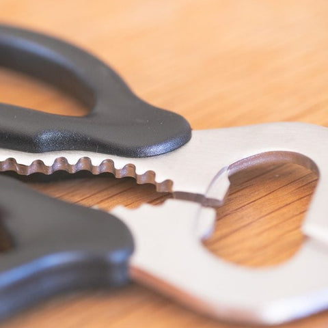 SUNCRAFT left-handed kitchen scissors with serrated blades and multifunction features, ergonomic handle, made in Japan.