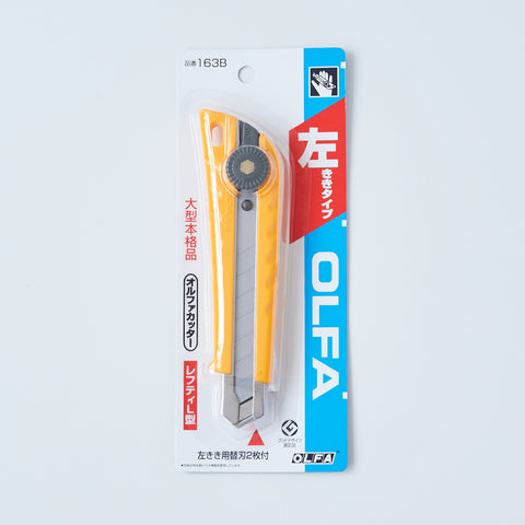 Left-handed OLFA utility knife with ergonomic design, reversed lever for smooth blade operation, includes two replacement blades, suitable for packaging, crafting, and DIY, made in Japan.