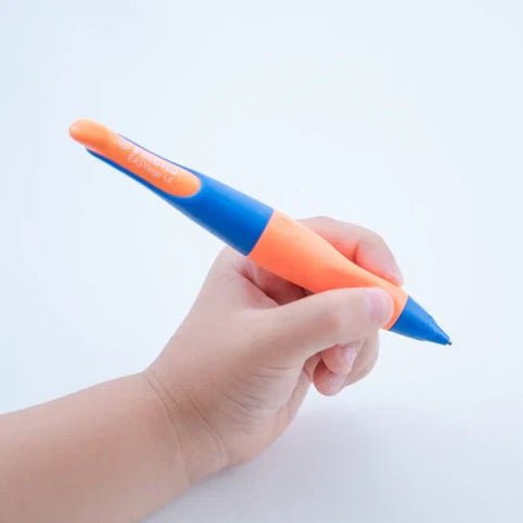 Child holding the left-handed Stablio EasyErgo mechanical pencil comfortably in their hand