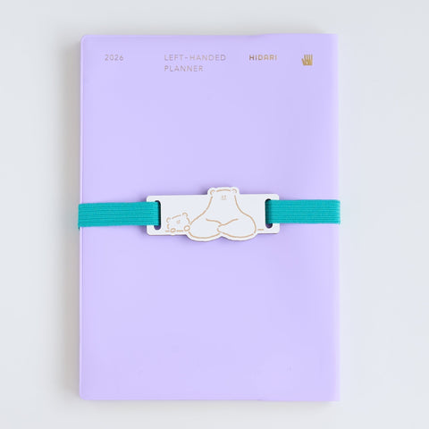 HIDARI Left-Handed Planner 2026 in Lavender paired with a Turquoise Polar Bear Book Band