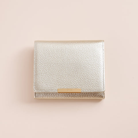 Left-handed wallet in Champagne Gold embossed leather, handcrafted by YAMATOU in Japan.