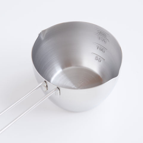 Stainless steel measuring cup 200ml ambidextrous design with dual spouts and long handle, made in Tsubame, Japan.