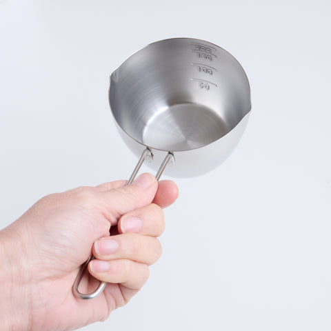 Stainless steel measuring cup 200ml ambidextrous design with dual spouts and long handle, made in Tsubame, Japan.