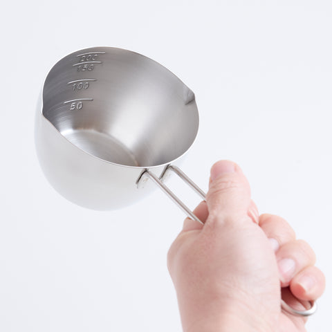 Stainless steel measuring cup 200ml ambidextrous design with dual spouts and long handle, made in Tsubame, Japan.