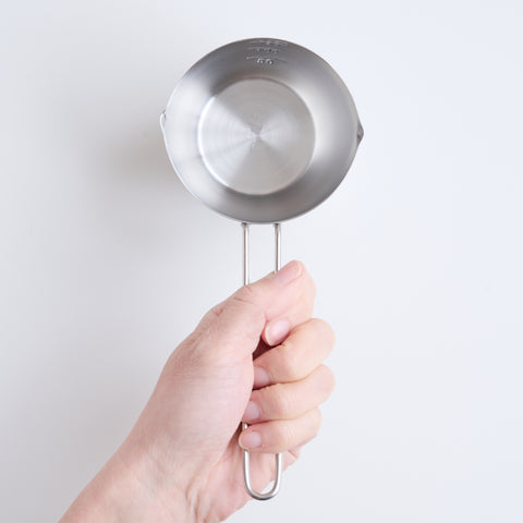 Stainless steel measuring cup 200ml ambidextrous design with dual spouts and long handle, made in Tsubame, Japan.