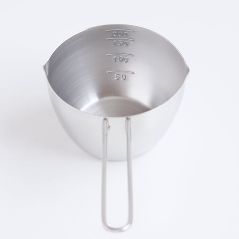 Stainless steel measuring cup 200ml ambidextrous design with dual spouts and long handle, made in Tsubame, Japan.