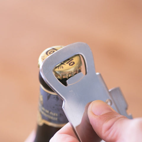 Can and bottle opener, left-handed